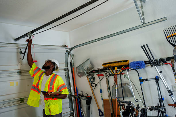 Professional Garage Door Panel Replacement technician working in Benton County County, MS